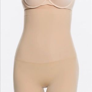 Spanx size large mid thigh to under busy shapewear